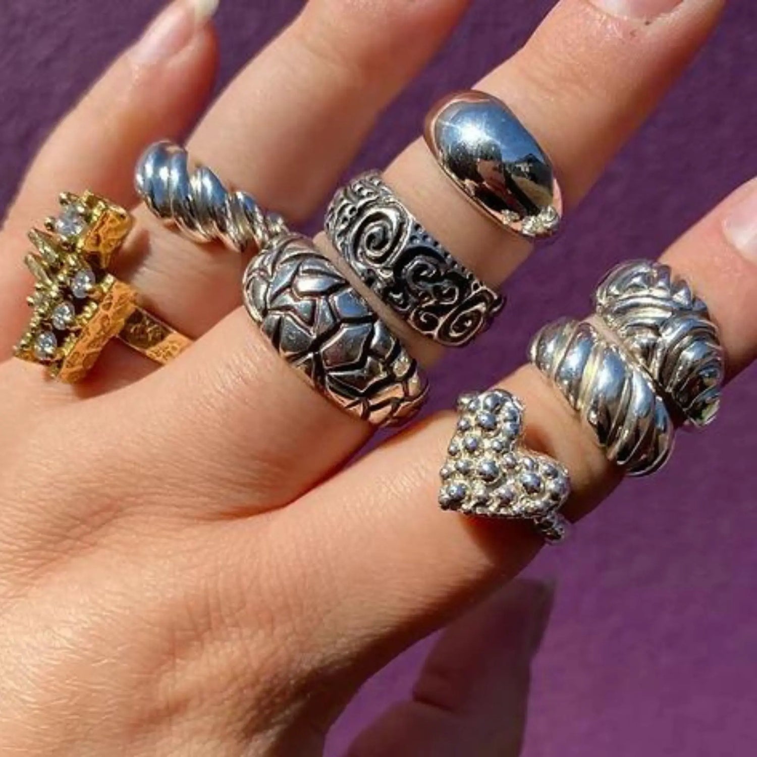 A selection of ORGANIC_CABOCHON_Rings handcrafted by Madame Mak Jewellery, showcasing their unique shapes and vibrant colors